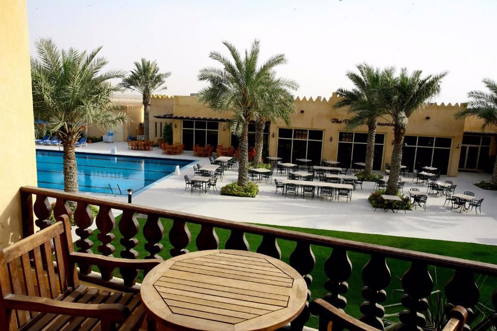 Отдых Отель Al Hamra Village Hotel 4* - Внутренний двор