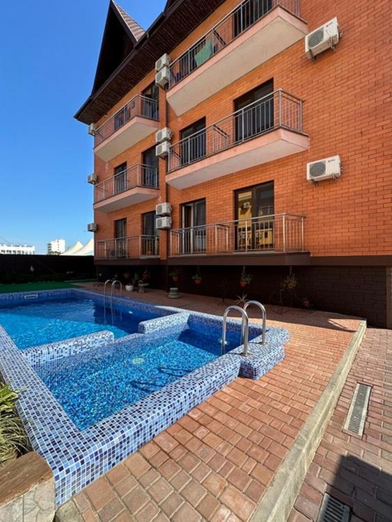 Отдых Гостевой дом Риф - Фасад гостевого дома и бассейн