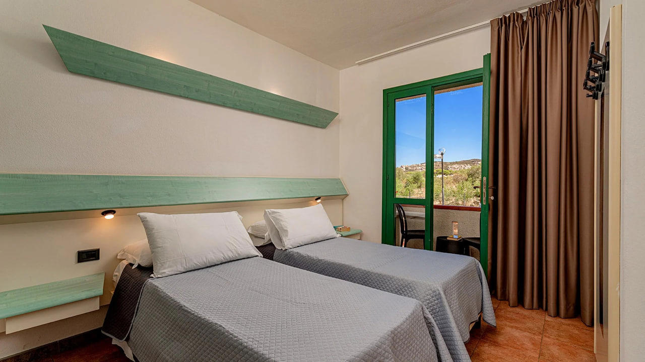 Отдых Отель Club Esse Cala Bitta - Номер в отеле